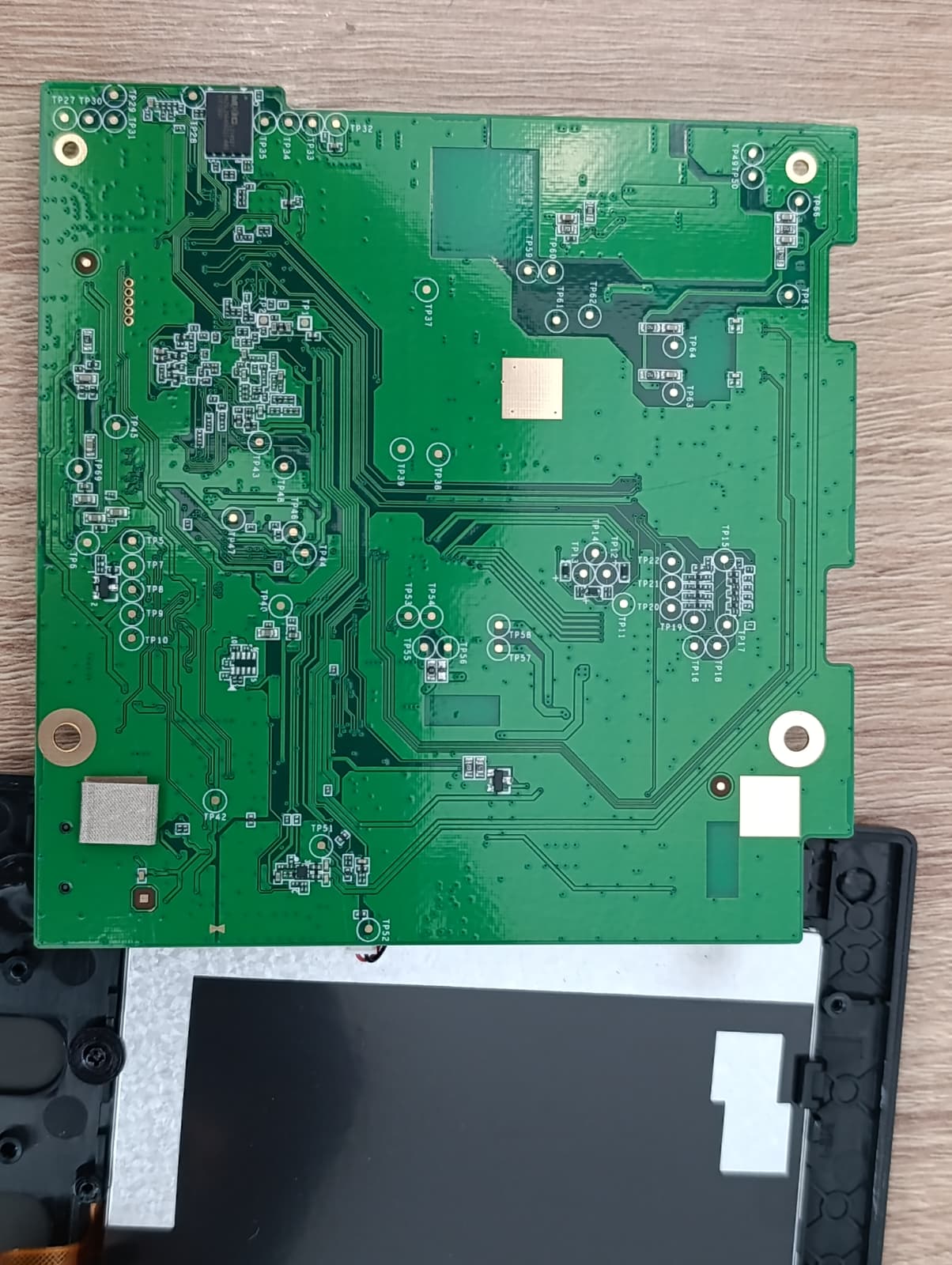 The DS-KH6320-WTE1 mainboard, reassembled with its touch panel, ready for UART console access